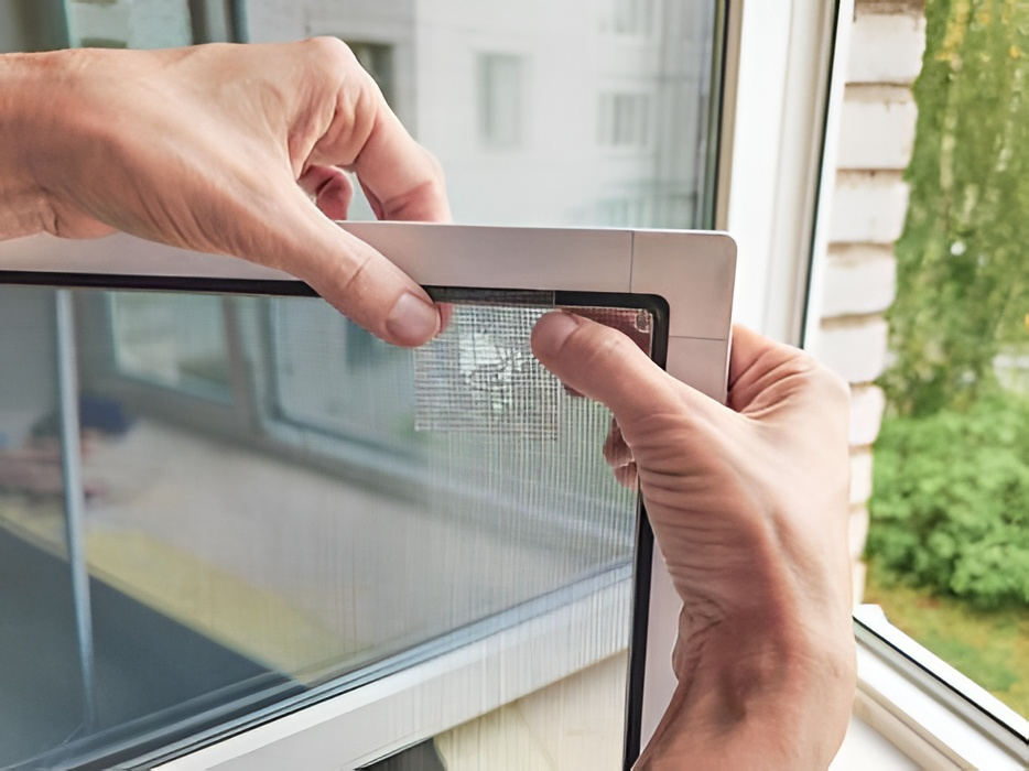 Screen repair service — re-screening torn window and door screens
